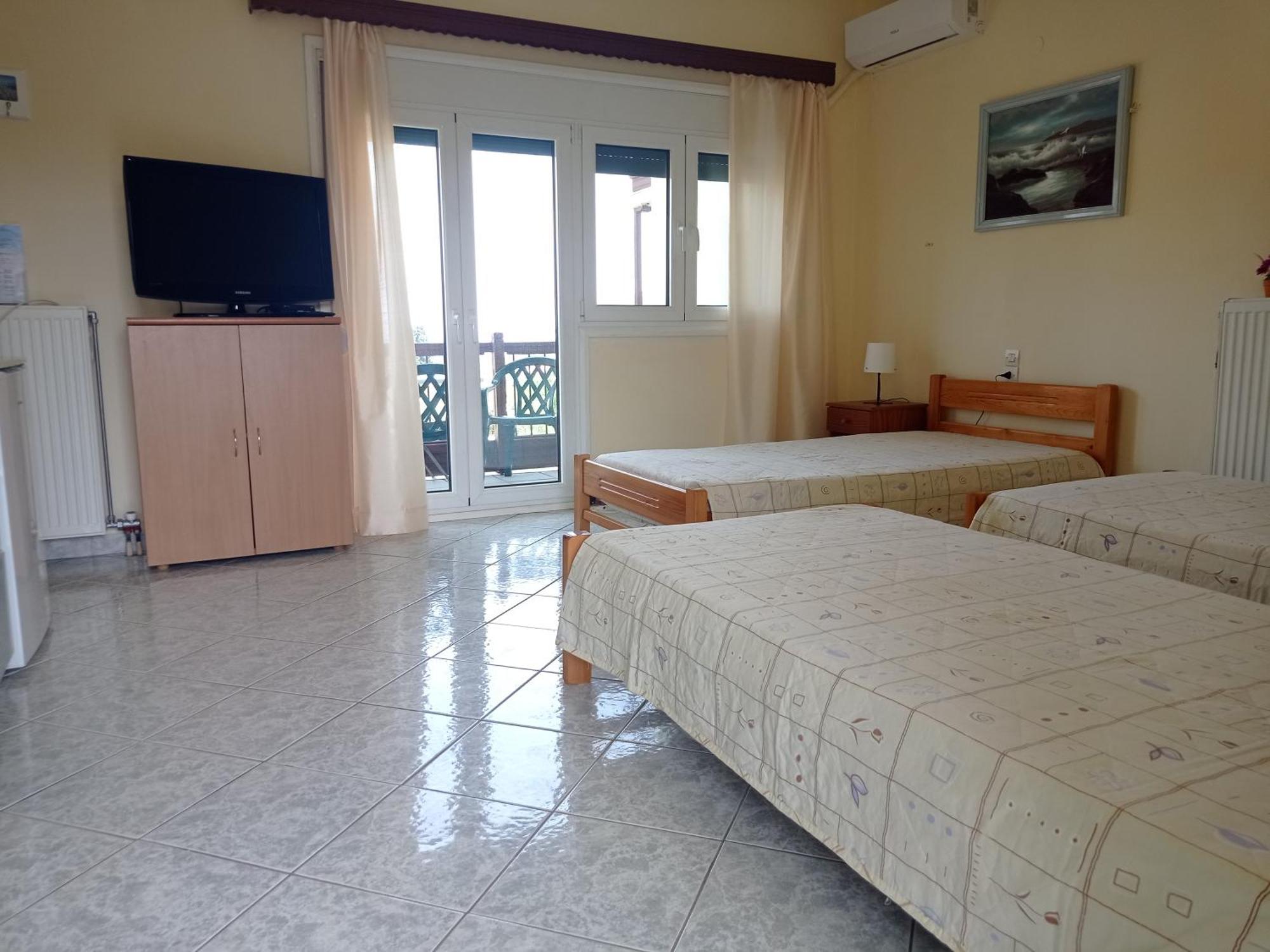 Alexandros Rooms & Studios Скопелос Екстериор снимка